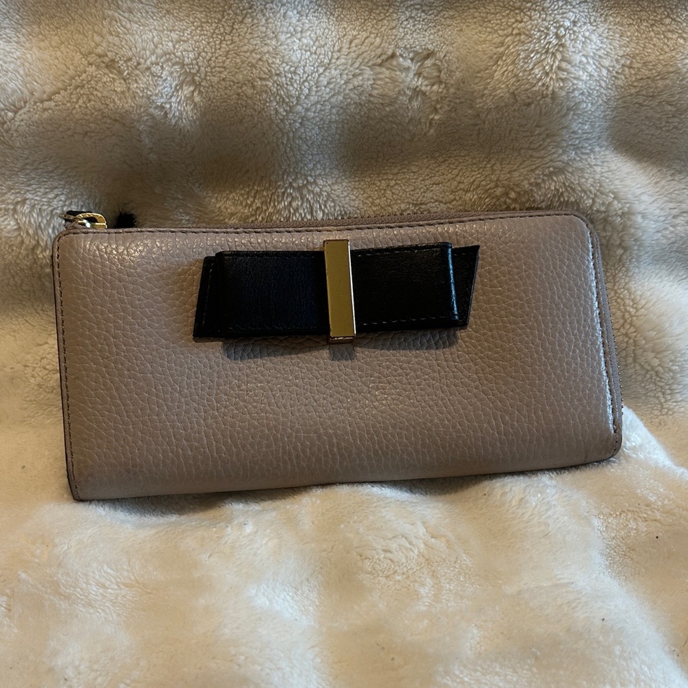 kate spade Taupe Zip Wallet with Black Bow and Gold Accent